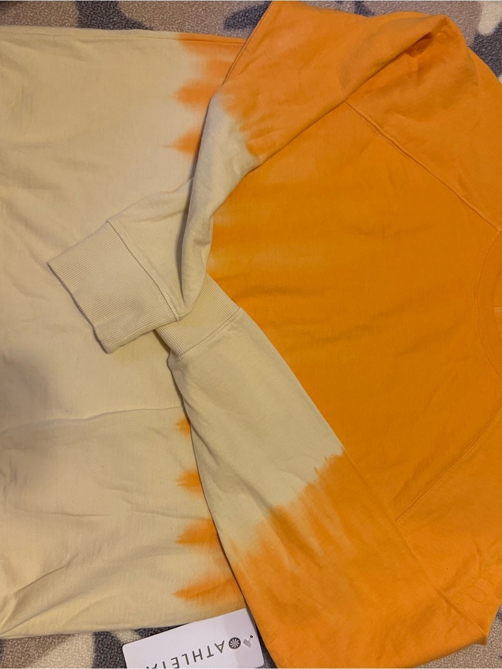 Athleta Orange and Cream Tie-Dye Hoodie